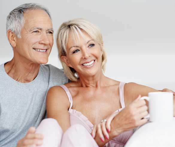 Couple Smiling with Dental implants Couple Smiling with Dental implants